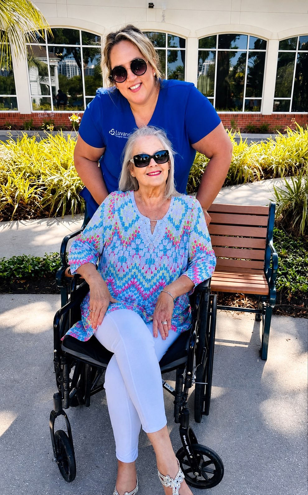 Luvarel caregiver with a client outdoors